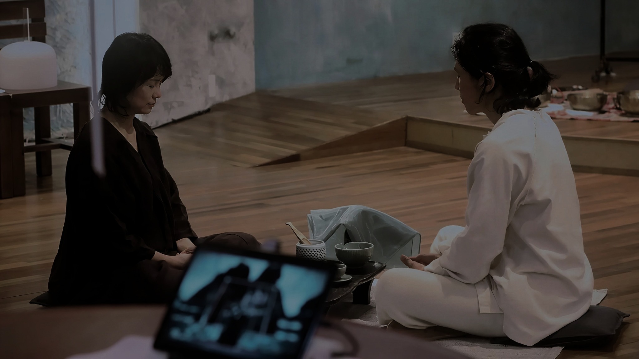 Soojin Pray seated in a live performance at 10 Years After Ground, Gwangju, 2024