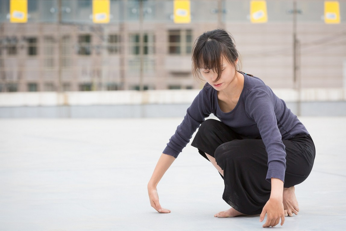 Soojin Pray conducting rooftop body research in 2015